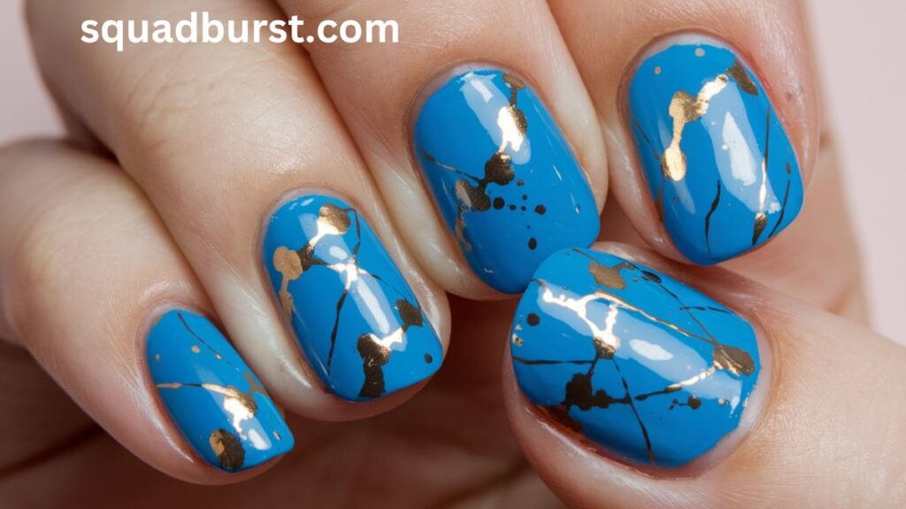 Abstract blue nails with gold lines: Blue Fall Nail Designs
