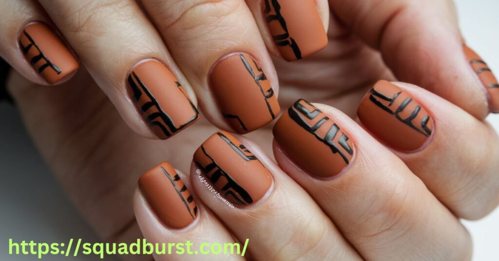 Square Matte Burnt Orange Nails with Black Accents